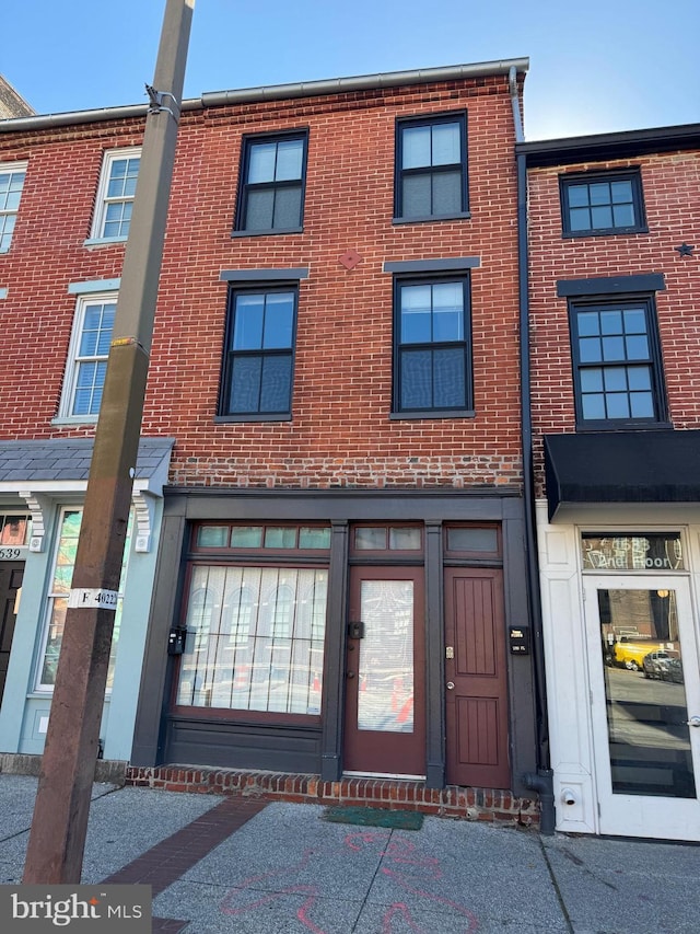 1637 Fleet St, Baltimore, MD 21231 - view of front of house with brick siding
