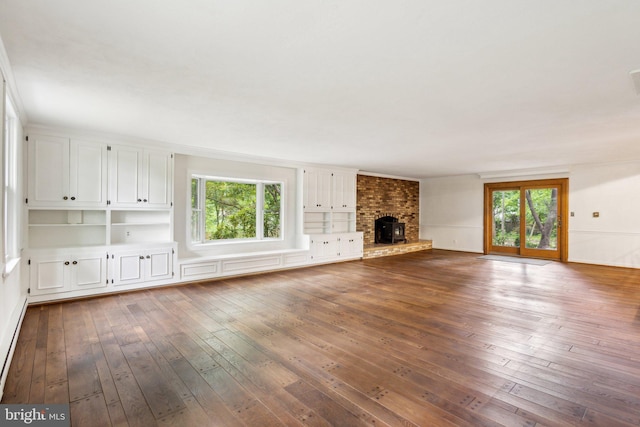 5936 River Dr, Lorton, VA 22079 - unfurnished living room with healthy amount of natural light, dark wood finished floors, and a fireplace