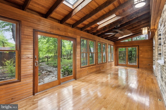 5936 River Dr, Lorton, VA 22079 - unfurnished sunroom with wood walls, a skylight, wood ceiling, healthy amount of natural light, and hardwood / wood-style floors