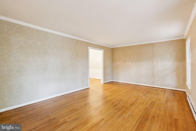 5936 River Dr, Lorton, VA 22079 - spare room featuring light wood-style floors, crown molding, baseboards, and baseboard heating