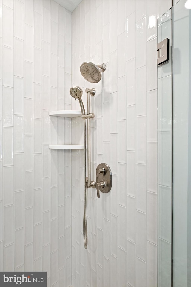 room details with a tile shower