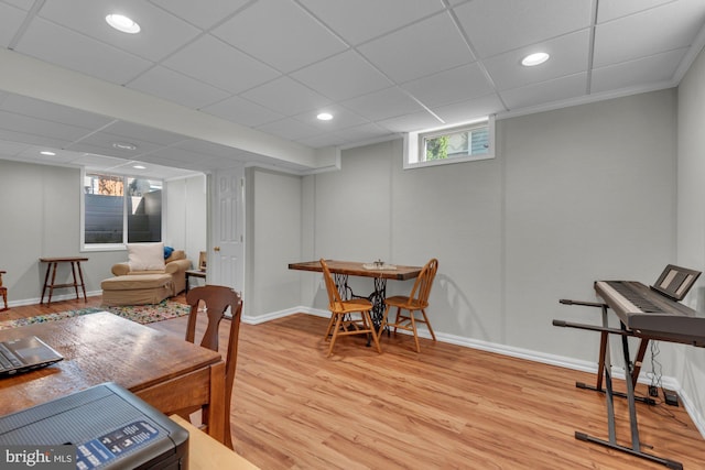 dining area with recessed lighting, baseboards, and wood finished floors