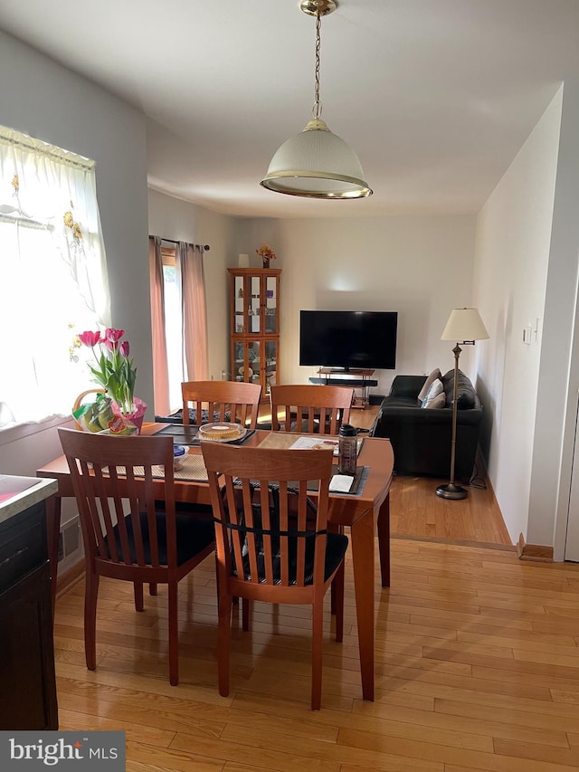 24 Elm Dr, Hightstown, NJ 08520 - dining space featuring light wood-style floors and baseboards