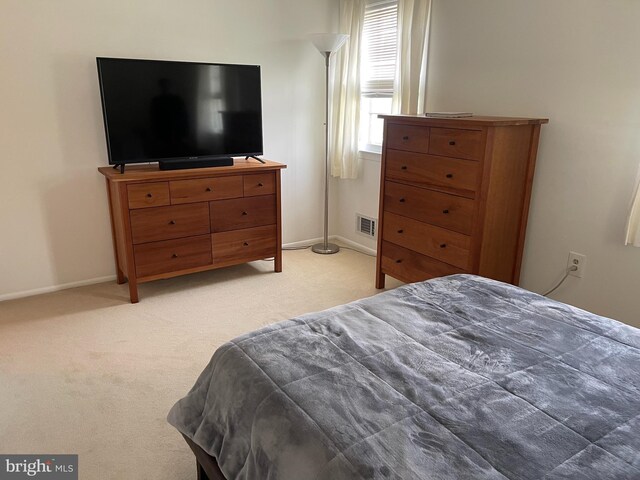 24 Elm Dr, Hightstown, NJ 08520 - bedroom featuring visible vents, baseboards, and light colored carpet