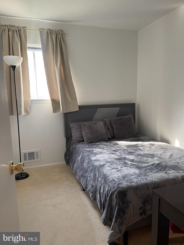 24 Elm Dr, Hightstown, NJ 08520 - carpeted bedroom with visible vents and baseboards
