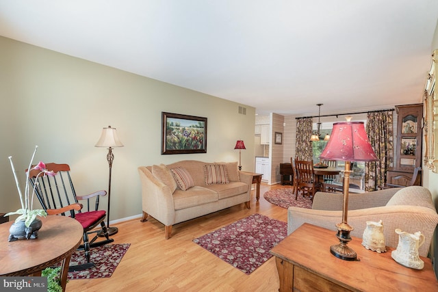 6 Dewberry Way, Bel Air, MD 21014 - living area featuring light wood-style floors, baseboards, and visible vents