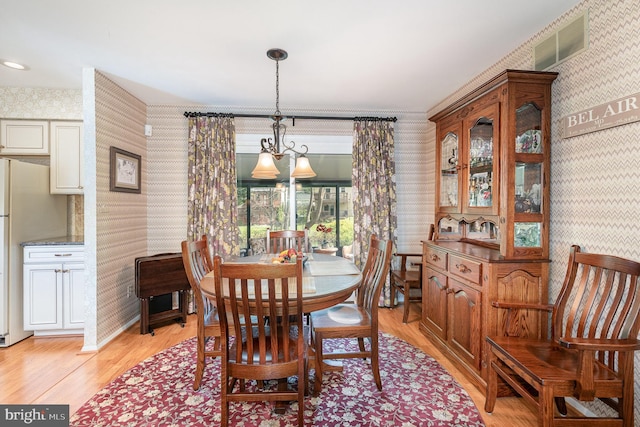 6 Dewberry Way, Bel Air, MD 21014 - dining room featuring visible vents, light wood-style floors, and wallpapered walls