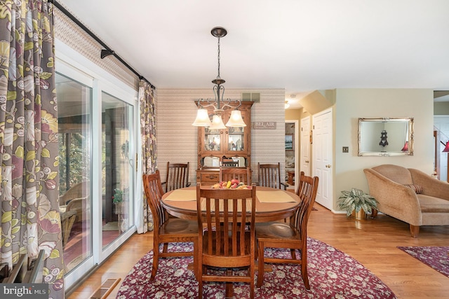 6 Dewberry Way, Bel Air, MD 21014 - dining space featuring wallpapered walls, light wood finished floors, and visible vents