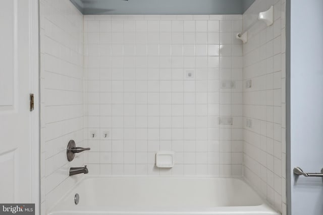 full bathroom featuring  shower combination
