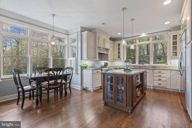 2656 Queen Anne Cir, Annapolis, MD 21403 - kitchen featuring dark wood-style flooring, glass insert cabinets, baseboards, and light stone countertops