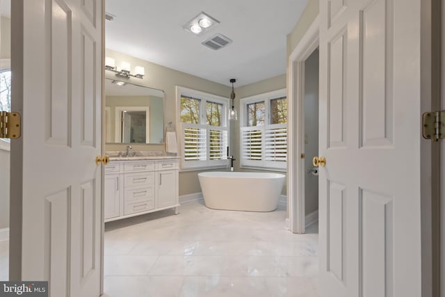 2656 Queen Anne Cir, Annapolis, MD 21403 - full bathroom featuring visible vents, baseboards, vanity, and a soaking tub