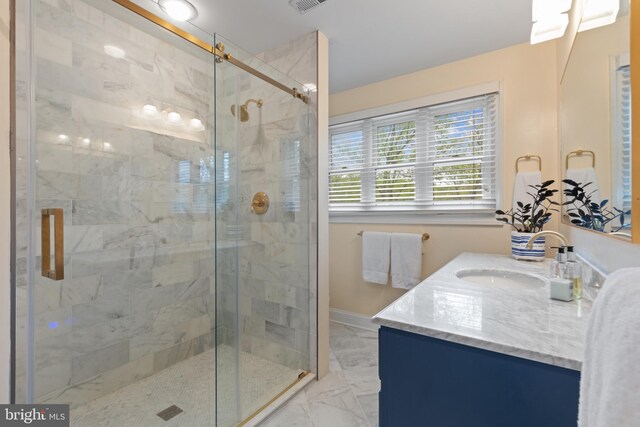 2656 Queen Anne Cir, Annapolis, MD 21403 - bathroom featuring vanity, visible vents, marble finish floor, a stall shower, and baseboards