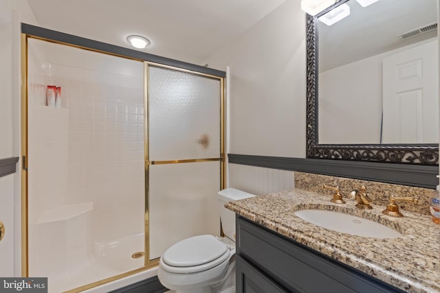 2656 Queen Anne Cir, Annapolis, MD 21403 - bathroom with a shower stall, vanity, visible vents, and toilet