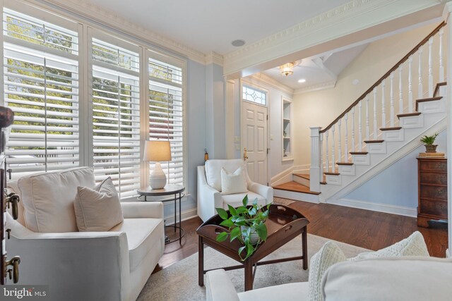2656 Queen Anne Cir, Annapolis, MD 21403 - living area with stairs, baseboards, ornamental molding, and wood finished floors