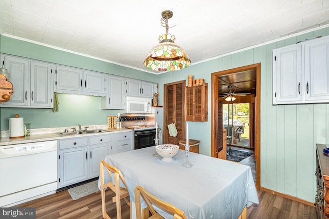 40 Dogwood Dr, Baltimore, MD 21220 - kitchen with crown molding, a sink, dark wood-style floors, and white appliances