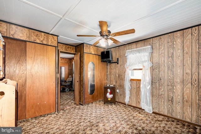 40 Dogwood Dr, Baltimore, MD 21220 - unfurnished bedroom with wooden walls and carpet flooring