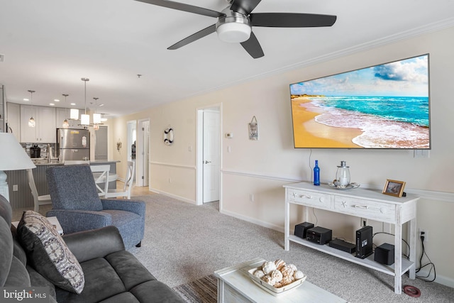 201 S Heron Dr Unit 1G, Harbour Club, Ocean City, MD 21842 - living area featuring light carpet, baseboards, crown molding, and ceiling fan