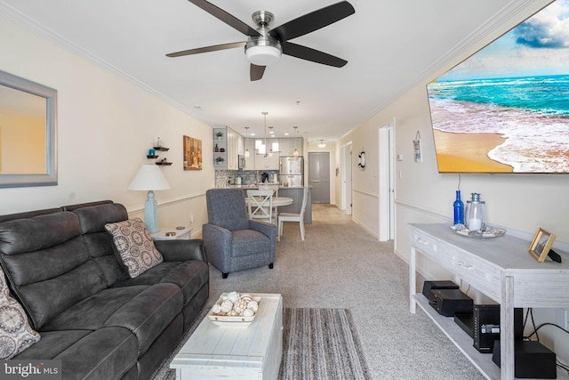 201 S Heron Dr Unit 1G, Harbour Club, Ocean City, MD 21842 - living area with ornamental molding, a ceiling fan, and light colored carpet