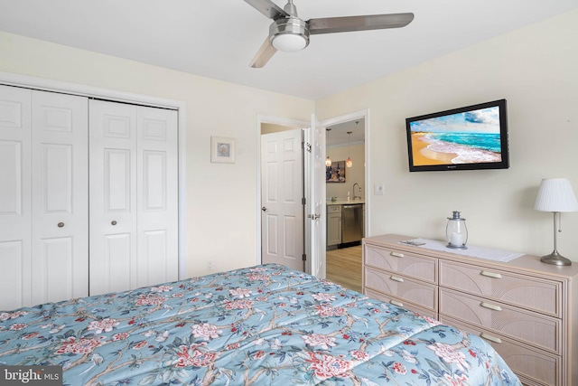 201 S Heron Dr Unit 1G, Harbour Club, Ocean City, MD 21842 - bedroom with a closet, light wood-style flooring, and a ceiling fan