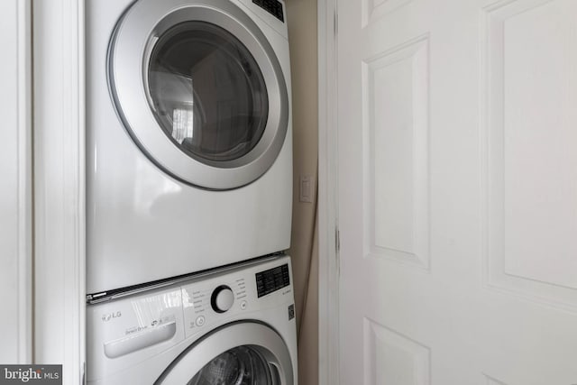 201 S Heron Dr Unit 1G, Harbour Club, Ocean City, MD 21842 - laundry area with stacked washing maching and dryer and laundry area