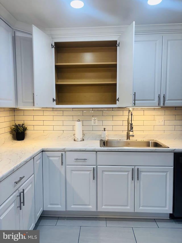 4714 Glenoak Rd, Hyattsville, MD 20784 - kitchen with open shelves, a sink, and light tile patterned floors