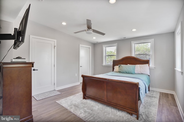 2116 R St NE, Washington, DC 20002 - bedroom with wood finished floors, recessed lighting, visible vents, and baseboards