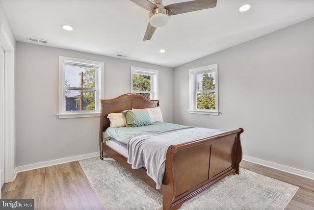 2116 R St NE, Washington, DC 20002 - bedroom featuring recessed lighting, wood finished floors, ceiling fan, baseboards, and visible vents