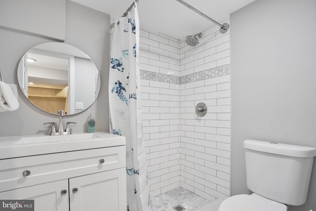 2116 R St NE, Washington, DC 20002 - bathroom with toilet, a tile shower, and vanity