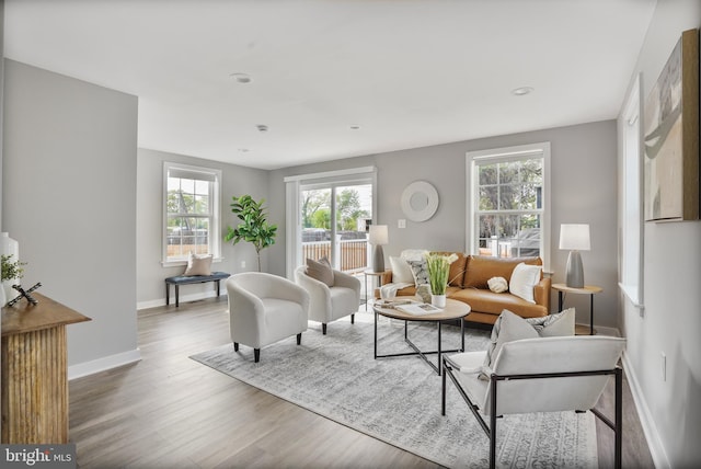 2116 R St NE, Washington, DC 20002 - living area featuring baseboards, wood finished floors, and recessed lighting
