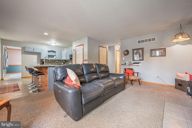 113 Fieldbrook, Magnolia, DE 19962 - living area featuring baseboards, light tile patterned flooring, light colored carpet, and recessed lighting