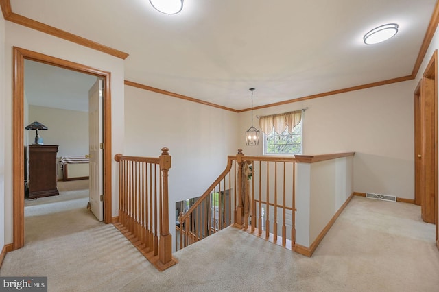 113 Fieldbrook, Magnolia, DE 19962 - hall with an upstairs landing, carpet floors, baseboards, and crown molding
