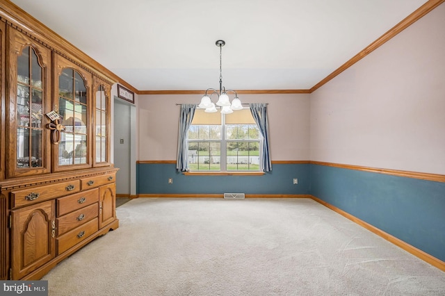 113 Fieldbrook, Magnolia, DE 19962 - unfurnished room with a chandelier, light carpet, ornamental molding, and baseboards
