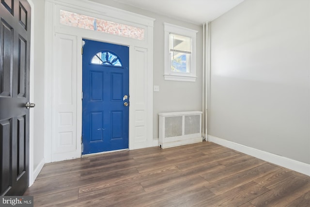4011 Hayward Ave, Baltimore, MD 21215 - foyer entrance with wood finished floors, baseboards, and visible vents