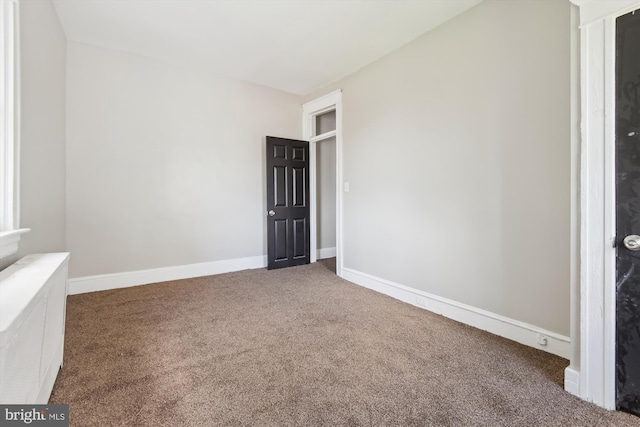 4011 Hayward Ave, Baltimore, MD 21215 - carpeted spare room with baseboards