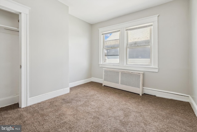 4011 Hayward Ave, Baltimore, MD 21215 - unfurnished bedroom featuring radiator heating unit, carpet, and baseboards