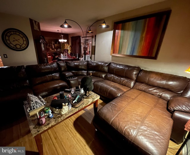 1108 Lilly Ln, Jackson, NJ 08527 - living room with wood finished floors and a chandelier