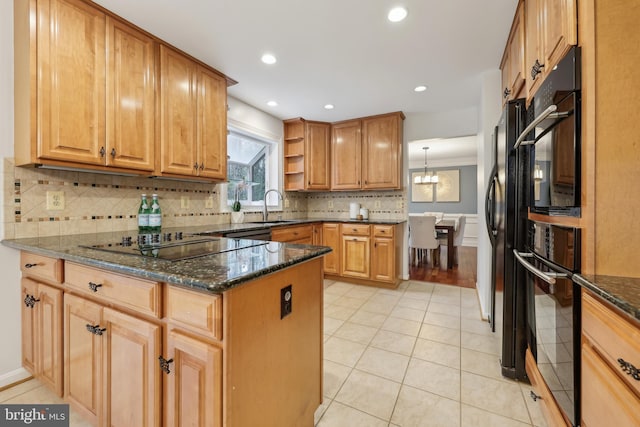 kitchen with a peninsula, open shelves, black appliances, dark stone countertops, and a sink