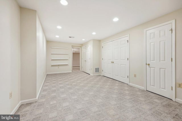 unfurnished bedroom with recessed lighting, visible vents, baseboards, and carpet floors