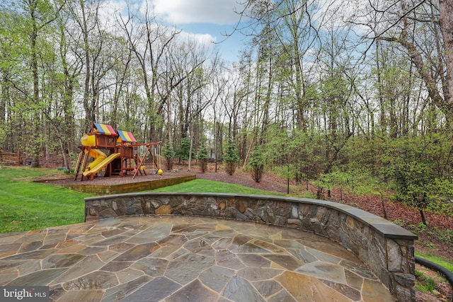 view of patio with a playground