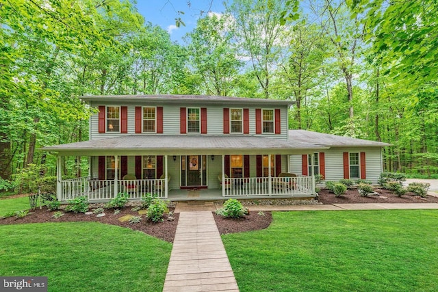 2409 Wood Stream Ct, Ellicott City, MD 21042 - view of front of property featuring covered porch and a front lawn