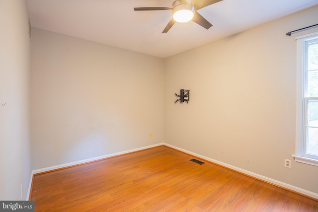 2409 Wood Stream Ct, Ellicott City, MD 21042 - empty room featuring light wood-type flooring, a ceiling fan, and baseboards