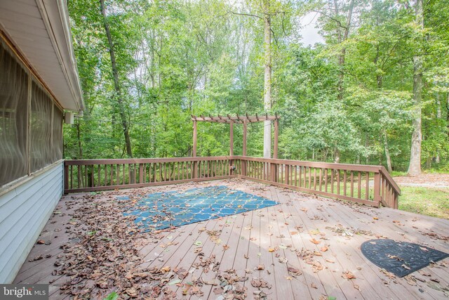 2409 Wood Stream Ct, Ellicott City, MD 21042 - wooden deck featuring a forest view