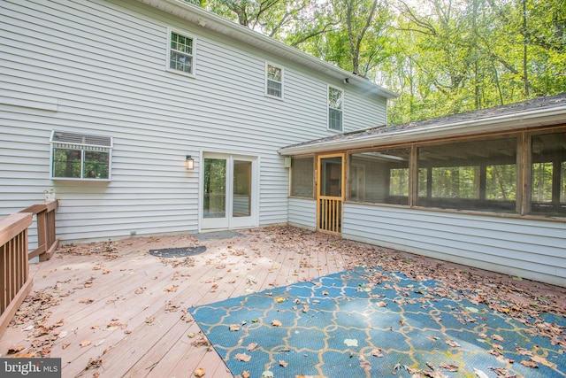 2409 Wood Stream Ct, Ellicott City, MD 21042 - rear view of house with a sunroom and a deck