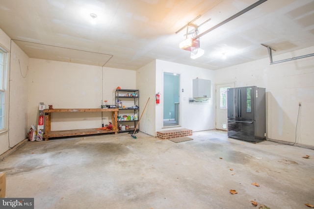 2409 Wood Stream Ct, Ellicott City, MD 21042 - garage featuring freestanding refrigerator