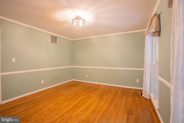 2409 Wood Stream Ct, Ellicott City, MD 21042 - unfurnished room with wood finished floors, baseboards, and ornamental molding