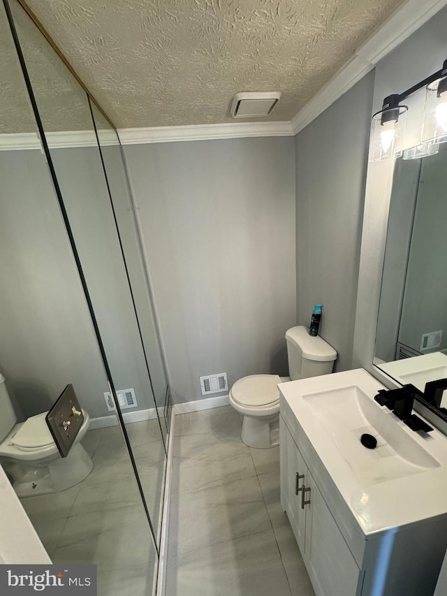 bathroom with crown molding, visible vents, and toilet