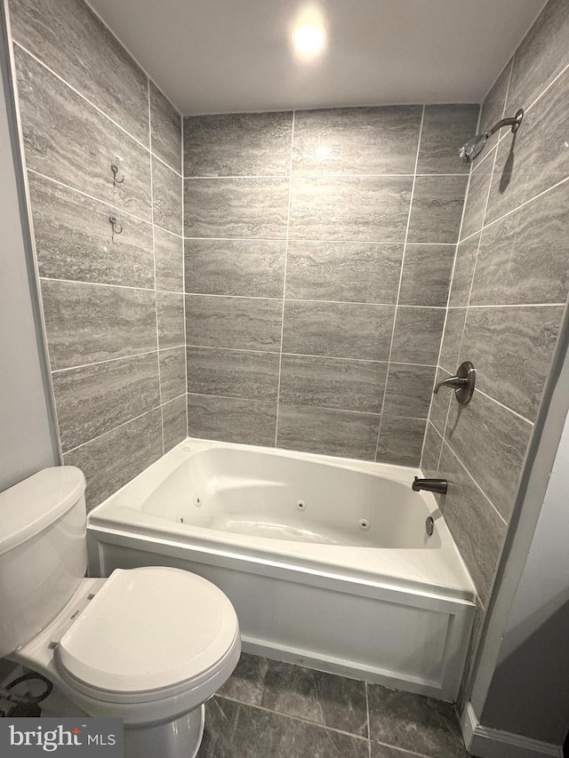 full bathroom with a combined bath / shower with jetted tub and toilet