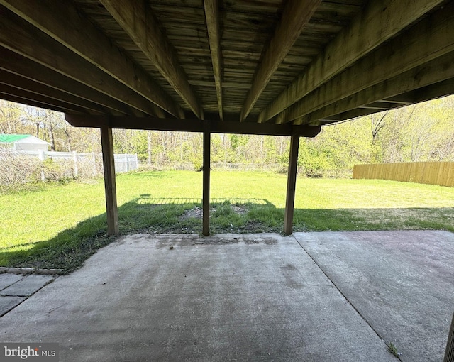 view of patio / terrace featuring fence
