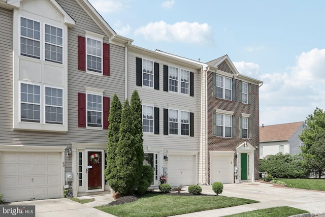 71 Clemens Ln, Turnersville, NJ 08012 - view of property featuring an attached garage and driveway