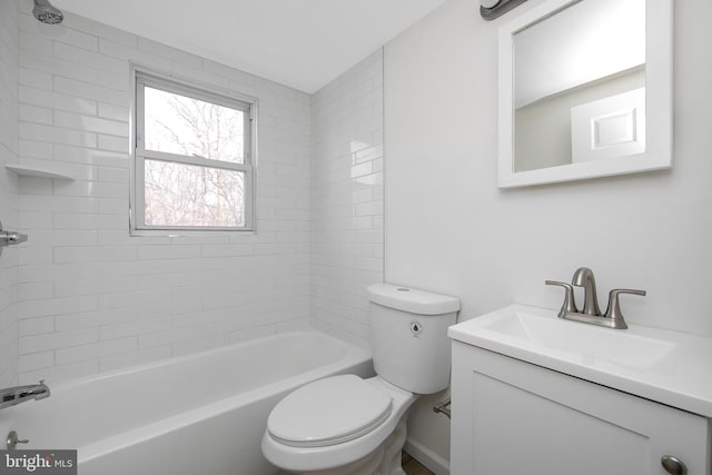 bathroom featuring toilet, vanity, and washtub / shower combination